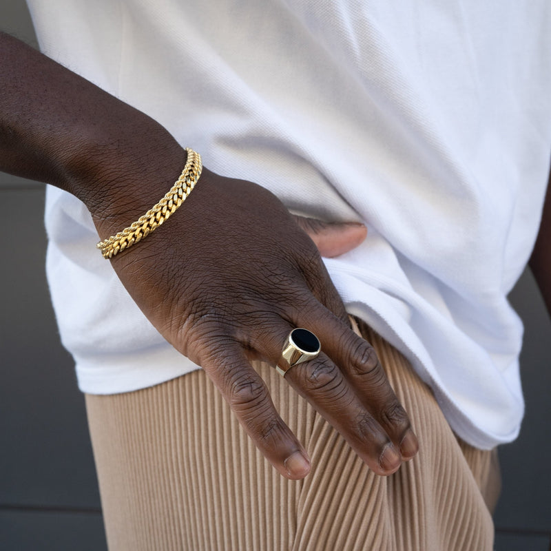 ZEGELRING ONYX OVAAL 585 GOUD