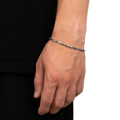 gefacetteerde zeshoek armband elastisch 750 witgoud