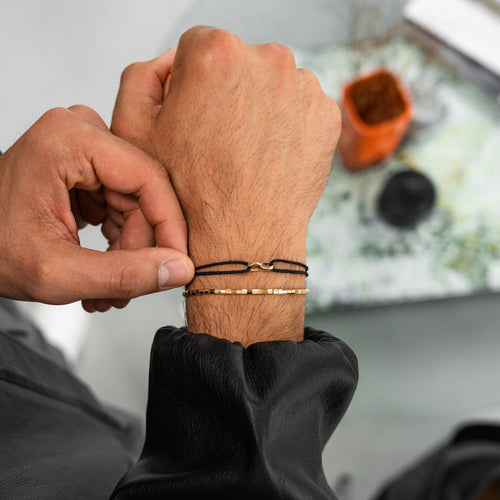 GLORIE ARMBAND ZWART STOF ARMBAND 585 GOUD