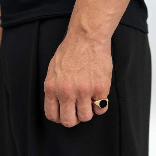 ZEGELRING ONYX OVAAL 585, 750 GOUD