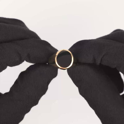 ZEGELRING ONYX OVAAL 585 GOUD